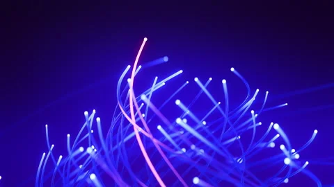 Light trail of glow fiber optic cables with red and blue light strands data flow Stock Footage 340172019