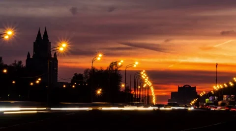 Light trail from intensive traffic on susnet, busy city, timelapse Stock Footage 57233457