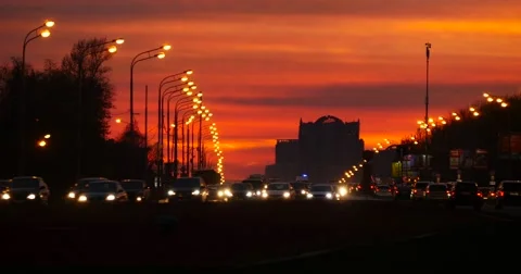 Light trail from intensive traffic on susnet, busy city Stock Footage 63207721