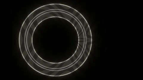 Light trails create circular patterns on a black background Stock Footage 339498326