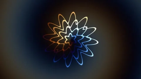Light trails create a colorful flower shape on dark Stock Footage 338242015
