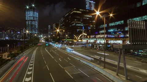 The light trails on the modern building background in Hong Kong City. Видео 55666748