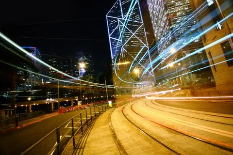 Light trails on the modern building background Stock Photos