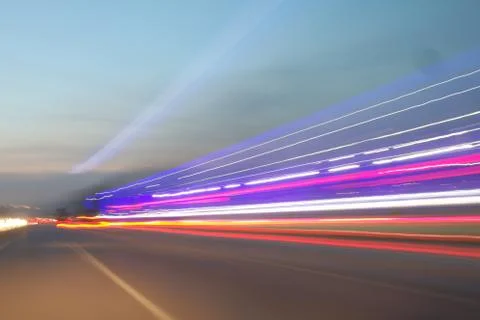 Light trails on sky background. Stock Photos