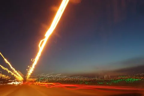 Light trails on sky background. Stock Photos