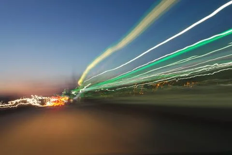 Light trails on sky background. Stock Photos