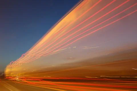 Light trails on sky background. Stock Photos