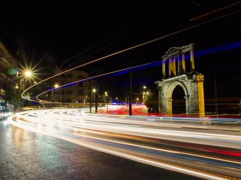 Light trails under Hadrian Arch, Athens, Greece Stock-Fotos