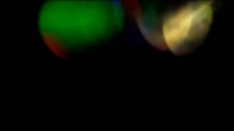 Light transmits bokeh of sparkling flickering lights. Stock Footage 117911254