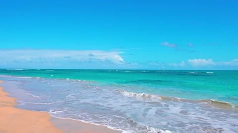 Light transparent waves on the sand of a Caribbean beach. Stock Footage 268830479
