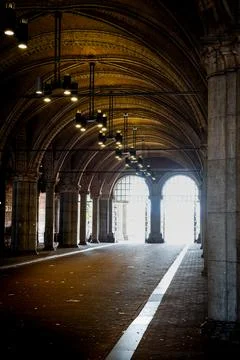 Light tunnel through an old building on the streets of Amsterdam Stock Photos