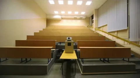 Light turned off, and then switched on, in empty lecture auditorium Stock-Footage 10568077