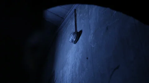 LIGHT TURNS ON (DARK BLUE WALL) Stock Footage 28074841