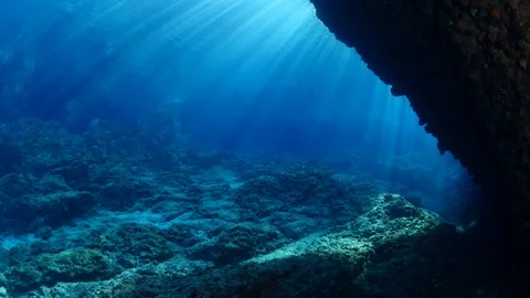 Light underwater sun shine rays and beams dark cave deep water for scuba divers Video stock 105202525