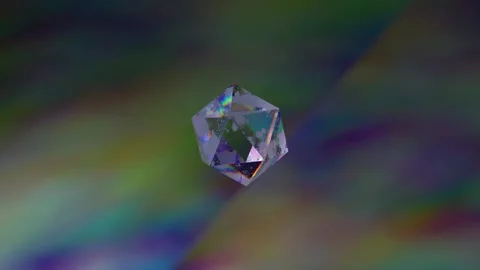 Light vibrates on the edges of a crystal flying against a colored background Stock Footage 144534534