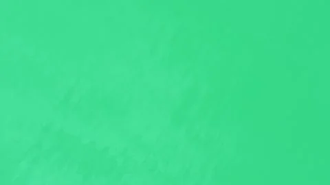 Light waves on the surface of the emerald-colored water. Aerial photography. Stock-Footage 200913409