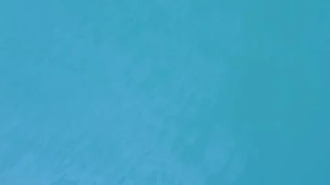 Light waves on the surface of the water are blue. Aerial photography. Vídeos de archivo 201340165