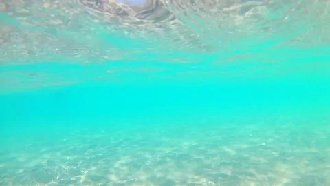 Light waves underwater near the sandy shore on a clear sunny day, Red Sea, Stock Footage 114656701