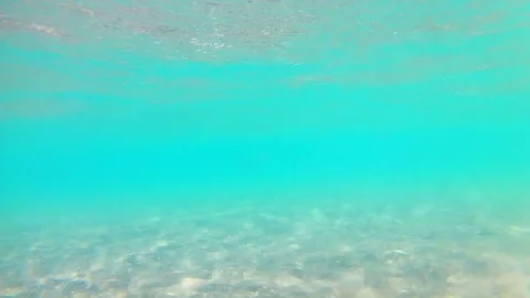 Light waves underwater near the sandy shore on a clear sunny day, Red Sea, sandy Stock Footage 115367669
