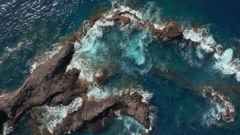Light Waves Washing Volcanic Rock Pools Stock Footage 189411541