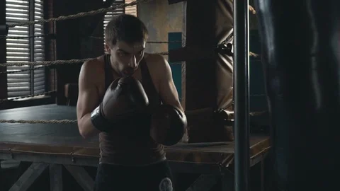 Light weight boxer training in vintage stylized gym slowmo Stock Footage 87831611