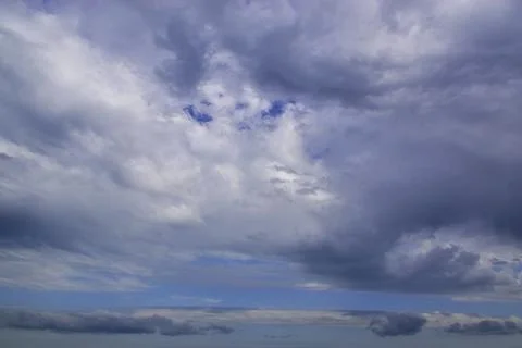 Light white clouds in the blue sky. Great background for graphic projects Photos