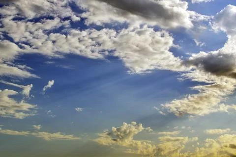Light white clouds in the blue sky. Great background for graphic projects Photos