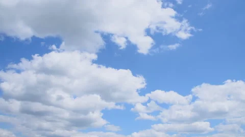 Light white clouds a bright blue sky. Clear sky at sunny summer day. Stock Footage 154552057