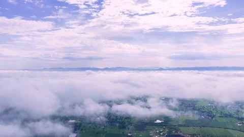 Light white clouds flew past in the bright blue sky. The summer of the sun's sco Stock-Footage 163710888