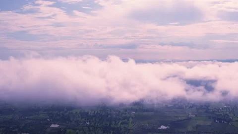 Light white clouds flew past in the bright blue sky. The summer of the sun's sco Stock-Footage 163710899