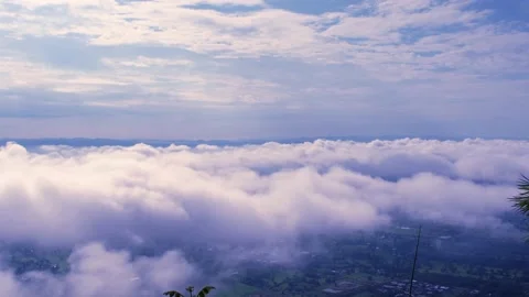 Light white clouds flew past in the bright blue sky. The summer of the sun's sco Stock-Footage 163710900