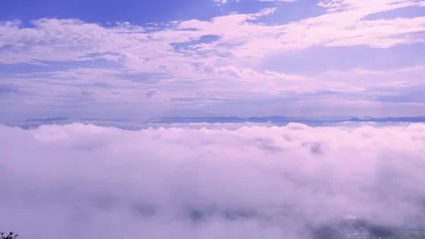 Light white clouds flew past in the bright blue sky. The summer of the sun's sco Stock-Footage 163710922