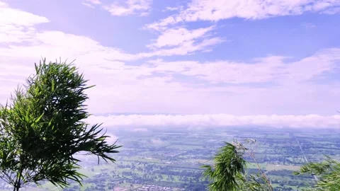 Light white clouds flew past in the bright blue sky. The summer of the sun's sco Stock-Footage 163710930