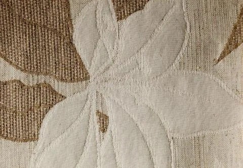 Light white strings forming a flower on a brown base Stock Photos