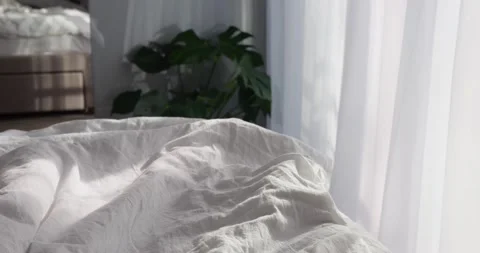 Light wind breeze in bedroom window with light tulle curtain sunny day Stock Footage 238467243