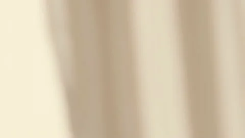 The light from the window shines on the wall, the shadow from the curtain Stock Footage 142539925