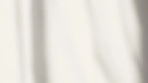 Light from the window on the wall, the transparent shadow from the curtain Vídeo Stock 142509252