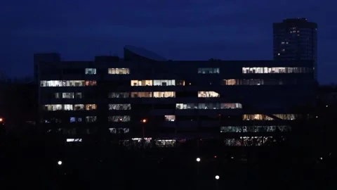 Light in the Windows of the business center, empty offices, evening. Stock Footage 119255466