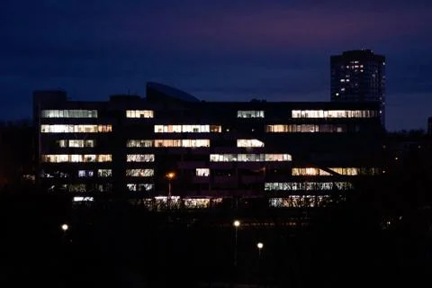 Light in the Windows of the business center, empty offices 写真素材