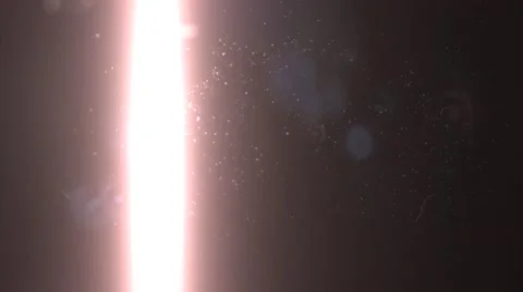 Light Wipes Back and Forth Through a Dirty Lens 4K Stock Footage 54705602