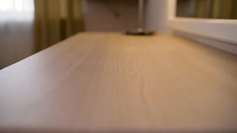 Light wood table surface with natural grain texture and soft focus background Stock Footage 341405524