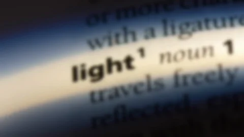 Light word in a dictionary. Stock Footage 99562234