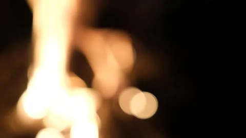 The light of yellow bonfire in dark blurred background Stock Footage 143695985