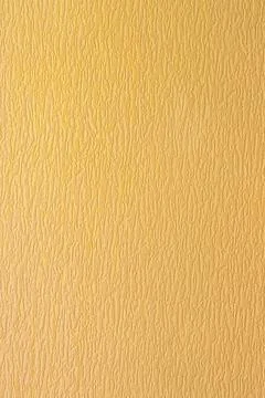 Light yellow embossed texture closeup wavy surface Stock Photos