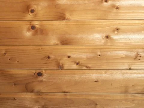 Light yellow pine boards with small knots and cracks Stock Photos