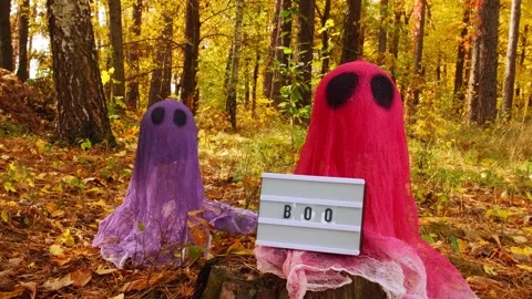 Lightbox BOO text Creative handmade Halloween holiday decoration. Colorful ghost Stock Footage 280517339