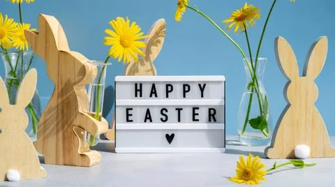 Lightbox with message HAPPY EASTER on festive blue background and eco-frie... Stock-Fotos