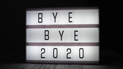 Lightbox with text BYE BYE 2020 in dark room Stock Footage 143237031