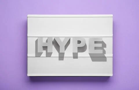 Lightbox with word Hype on violet background, top view Stock Photos