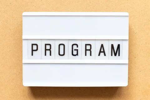 Lightbox with word program on wood background Foto stock